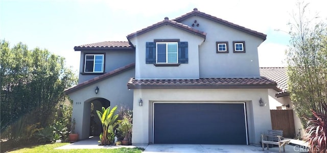 315 Fuente Dr, Guadalupe, CA 93434 - mediterranean / spanish-style home with an attached garage, driveway, and a tiled roof