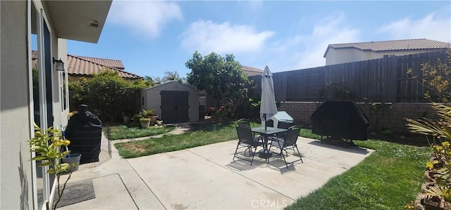 315 Fuente Dr, Guadalupe, CA 93434 - fenced backyard featuring a storage shed, a patio, outdoor dining space, and area for grilling