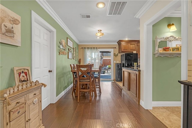 4477 Los Serranos Blvd, Chino Hills, CA 91709 - dining room with dark wood-style flooring and ornamental molding