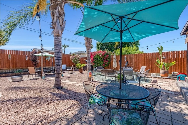 4477 Los Serranos Blvd, Chino Hills, CA 91709 - fenced backyard featuring outdoor dining space and a patio
