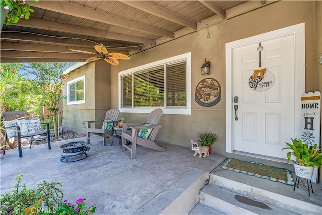 4477 Los Serranos Blvd, Chino Hills, CA 91709 - view of exterior entry with stucco siding and ceiling fan