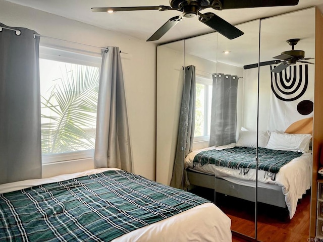 3029 Broadway Unit 22, San Diego, CA 92102 - bedroom featuring a ceiling fan and wood finished floors