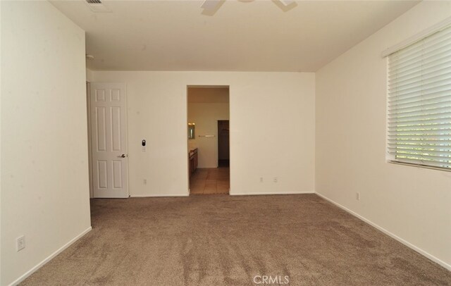 26508 Veramonte Ave, Murrieta, CA 92562 - carpeted empty room with ceiling fan and baseboards