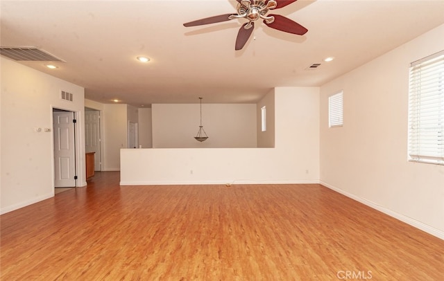26508 Veramonte Ave, Murrieta, CA 92562 - unfurnished living room with light wood-style flooring, recessed lighting, and a ceiling fan