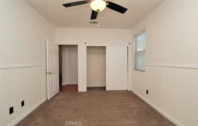 26508 Veramonte Ave, Murrieta, CA 92562 - unfurnished bedroom featuring carpet floors, a wainscoted wall, a ceiling fan, and a closet