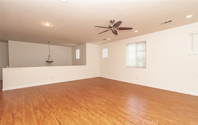 26508 Veramonte Ave, Murrieta, CA 92562 - unfurnished room with wood finished floors, recessed lighting, a ceiling fan, and plenty of natural light