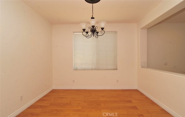 26508 Veramonte Ave, Murrieta, CA 92562 - unfurnished dining area featuring light wood-style floors and a chandelier