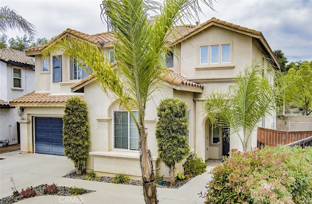 26508 Veramonte Ave, Murrieta, CA 92562 - view of front of property with a tiled roof, a garage, and stucco siding