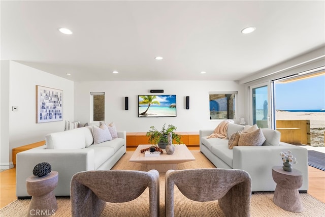 1554 E Oceanfront, Newport Beach, CA 92661 - living area with recessed lighting and light wood-style flooring