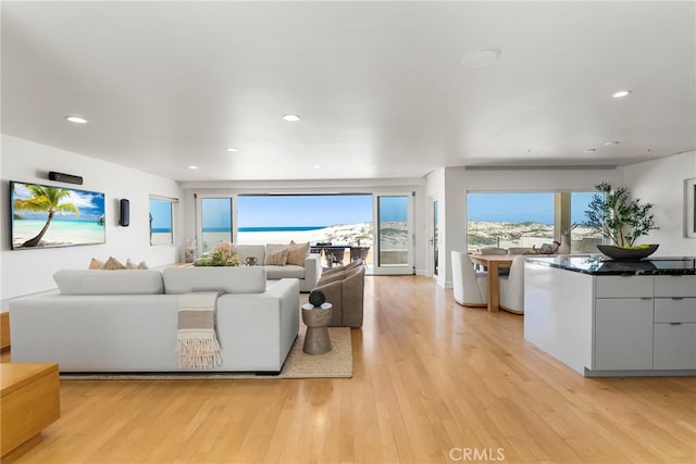 1554 E Oceanfront, Newport Beach, CA 92661 - living area featuring light wood-style floors and recessed lighting