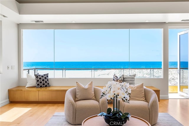 1554 E Oceanfront, Newport Beach, CA 92661 - living area with wood finished floors and a water view