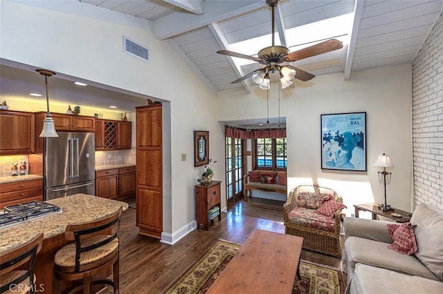 5591 Kenwood Ave, Buena Park, CA 90621 - living area with dark wood finished floors and ceiling fan