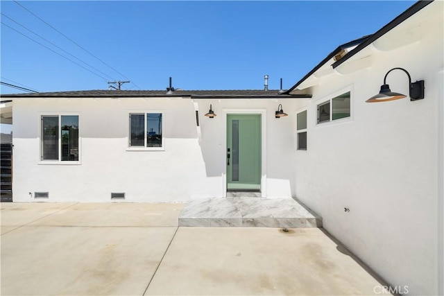 5001 N Darfield Ave, Covina, CA 91724 - back of property featuring crawl space, a patio area, and stucco siding