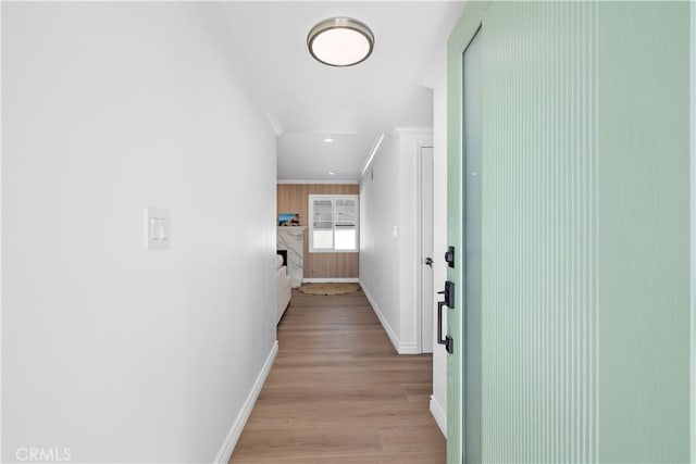 5001 N Darfield Ave, Covina, CA 91724 - hallway with ornamental molding, light wood-style flooring, and recessed lighting