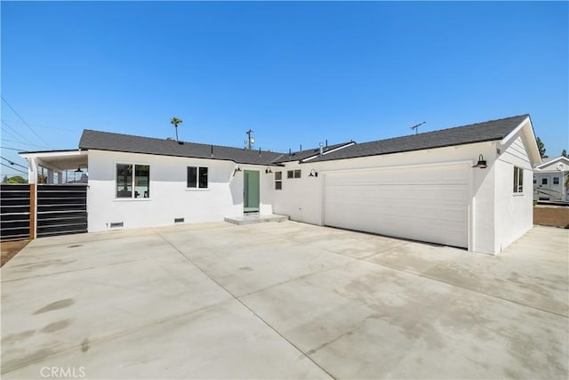 5001 N Darfield Ave, Covina, CA 91724 - ranch-style house featuring an attached garage, driveway, and stucco siding