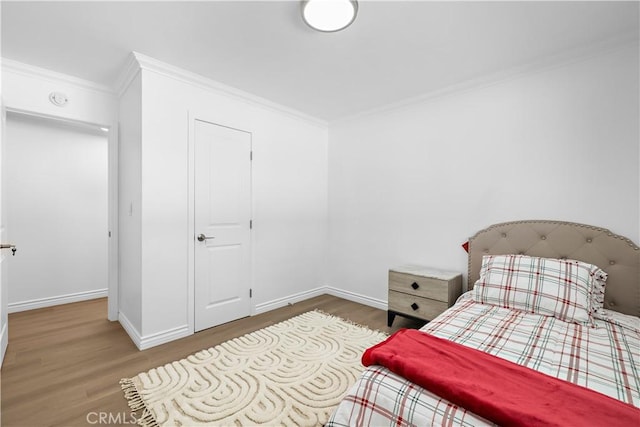 5001 N Darfield Ave, Covina, CA 91724 - bedroom featuring wood finished floors and ornamental molding