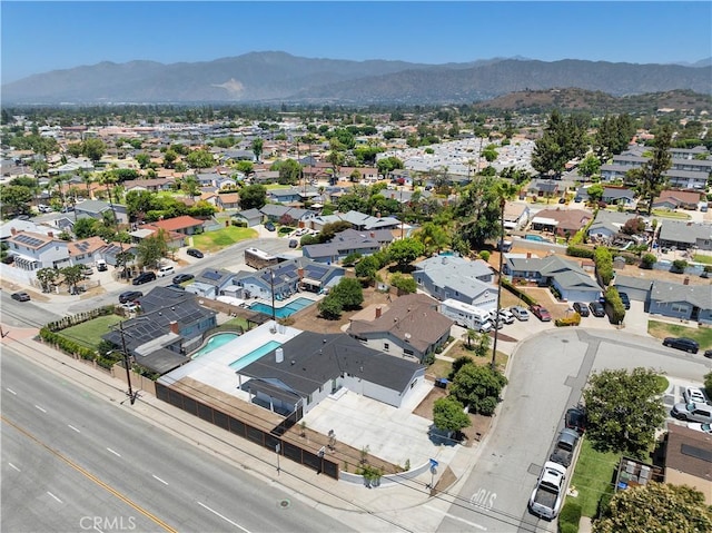 5001 N Darfield Ave, Covina, CA 91724 - aerial view of residential area featuring a mountain backdrop and a pool