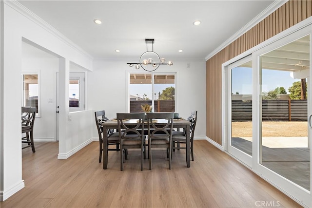 5001 N Darfield Ave, Covina, CA 91724 - dining space featuring healthy amount of natural light, ornamental molding, light wood-style flooring, a chandelier, and recessed lighting