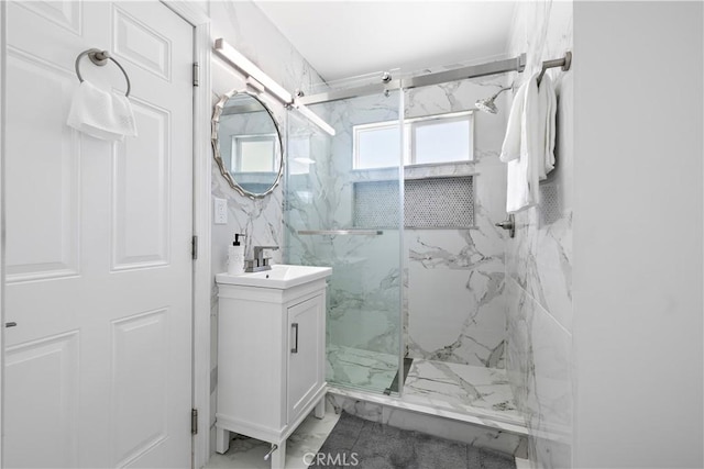 5001 N Darfield Ave, Covina, CA 91724 - full bathroom with marble look tiles, a marble finish shower, and vanity