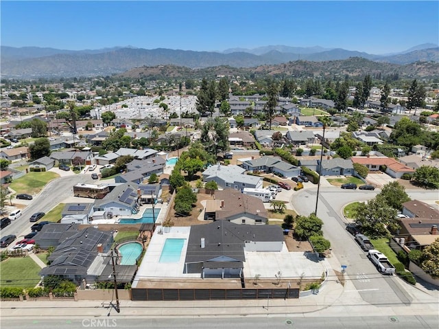 5001 N Darfield Ave, Covina, CA 91724 - aerial perspective of suburban area featuring a mountainous background and a pool