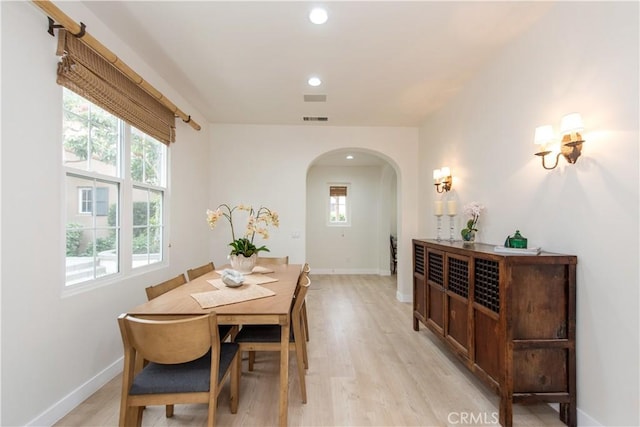 29 Windchime, Irvine, CA 92603 - dining space featuring arched walkways, healthy amount of natural light, light wood-type flooring, and recessed lighting