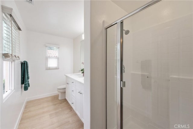 29 Windchime, Irvine, CA 92603 - bathroom featuring a shower stall, vanity, and wood finished floors