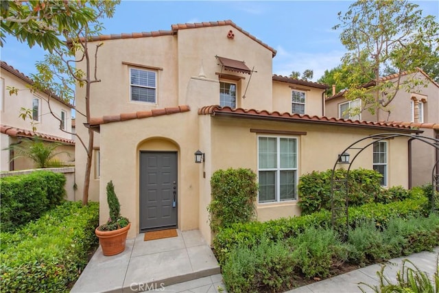 29 Windchime, Irvine, CA 92603 - mediterranean / spanish-style home with stucco siding and a tiled roof