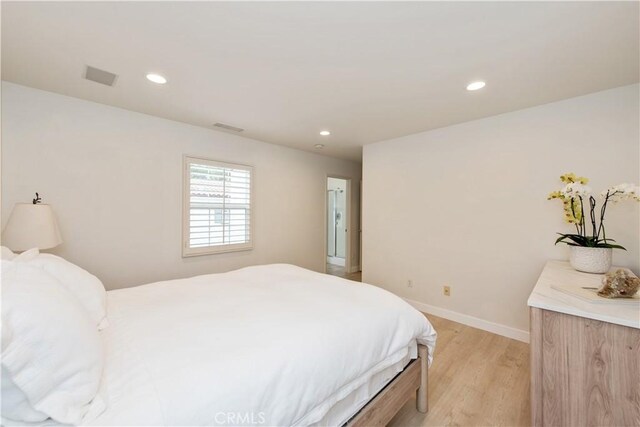 29 Windchime, Irvine, CA 92603 - bedroom featuring light wood finished floors and recessed lighting