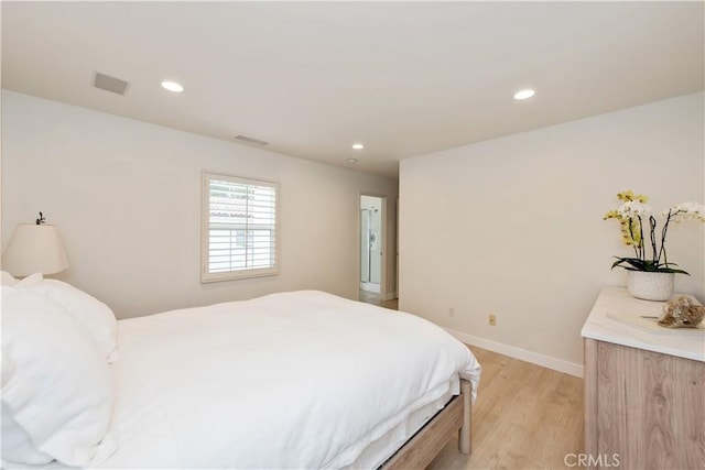 29 Windchime, Irvine, CA 92603 - bedroom featuring light wood-type flooring and recessed lighting