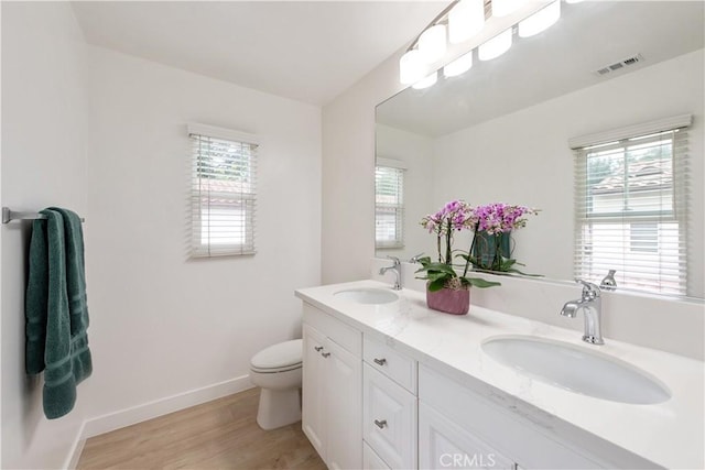 29 Windchime, Irvine, CA 92603 - bathroom with double vanity and wood finished floors