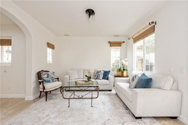 29 Windchime, Irvine, CA 92603 - living area with wood finished floors and arched walkways