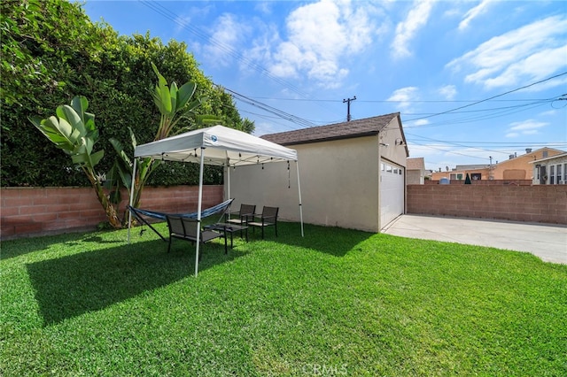 2729 Fairman St, Lakewood, CA 90712 - view of yard with driveway and a garage