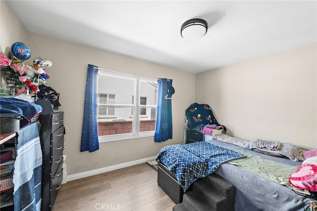 2729 Fairman St, Lakewood, CA 90712 - bedroom with wood finished floors and baseboards