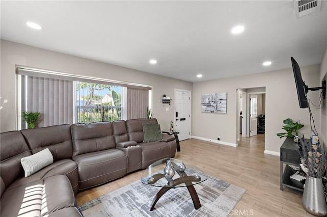 2729 Fairman St, Lakewood, CA 90712 - living room featuring light wood-style floors and recessed lighting
