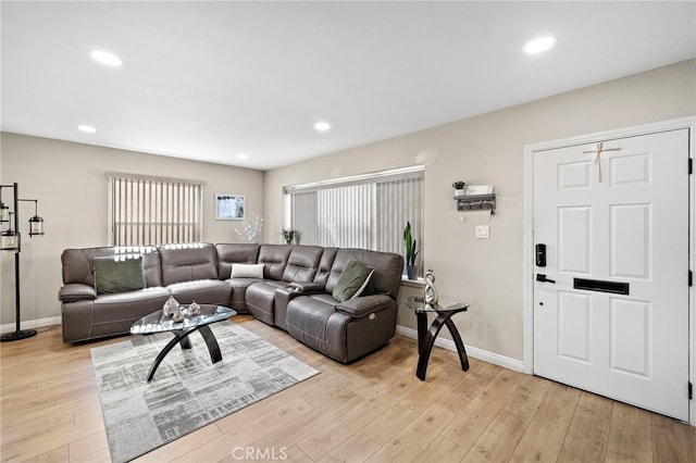 2729 Fairman St, Lakewood, CA 90712 - living room with light wood-style floors and recessed lighting