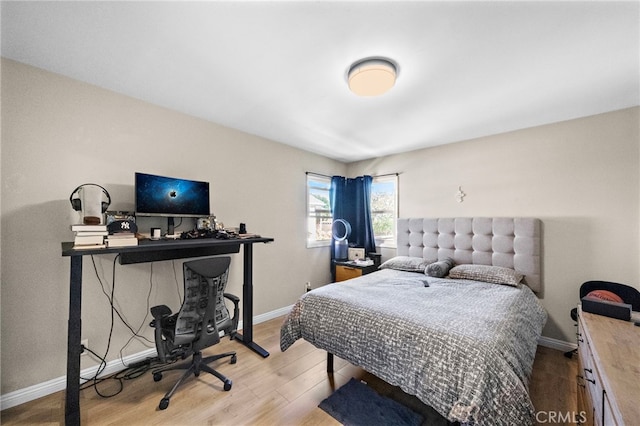 2729 Fairman St, Lakewood, CA 90712 - bedroom with wood finished floors and a desk