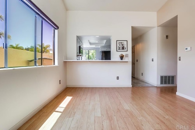 6942 Batiquitos, Carlsbad, CA 92011 - spare room featuring light wood-style floors