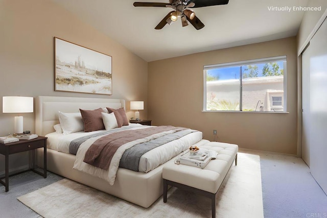 6942 Batiquitos, Carlsbad, CA 92011 - bedroom with light carpet and a ceiling fan