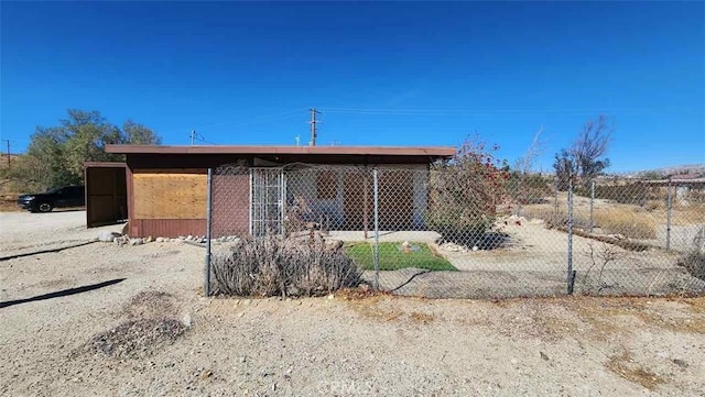 15236 Painted Hills Rd, Whitewater, CA 92282 - rear view of house featuring an outbuilding