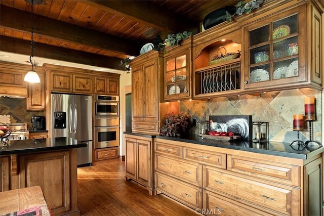 207 N Fairway Dr N, Lake Arrowhead, CA 92391 - kitchen with stainless steel appliances, a wood ceiling with exposed beams, dark countertops, tasteful backsplash, and brown cabinets