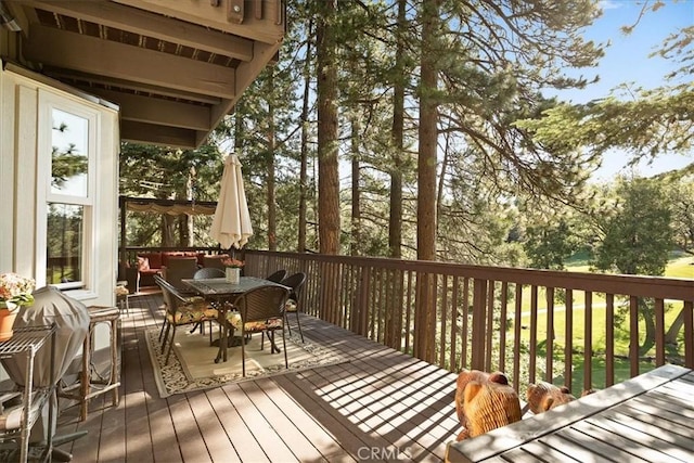 207 N Fairway Dr N, Lake Arrowhead, CA 92391 - wooden terrace with outdoor dining area