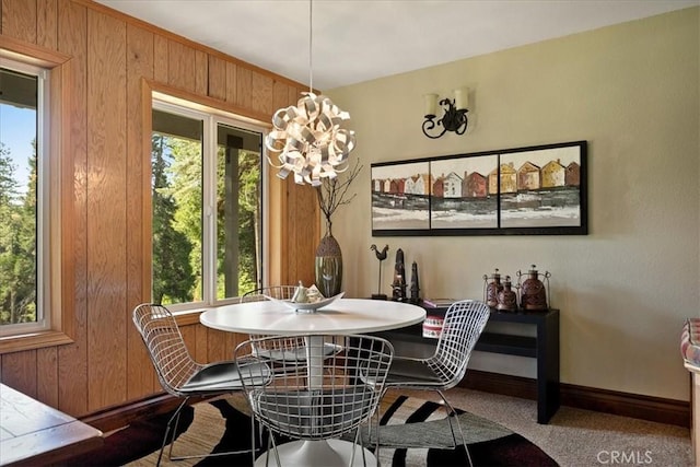 207 N Fairway Dr N, Lake Arrowhead, CA 92391 - dining room with a chandelier, wooden walls, and healthy amount of natural light