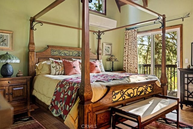 207 N Fairway Dr N, Lake Arrowhead, CA 92391 - bedroom with a wall mounted air conditioner, wood finished floors, and access to outside