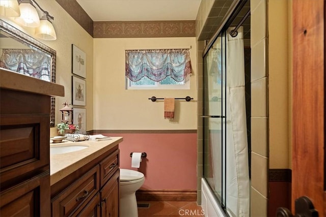 207 N Fairway Dr N, Lake Arrowhead, CA 92391 - bathroom with tile patterned floors, vanity, and bath / shower combo with glass door