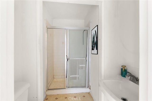 1450 Pepper Tree Ln, San Bernardino, CA 92404 - bathroom with a shower stall