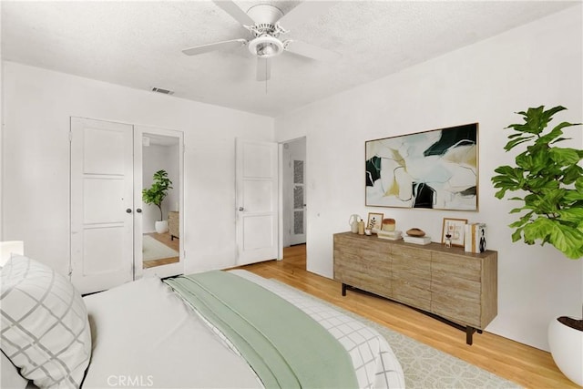 1450 Pepper Tree Ln, San Bernardino, CA 92404 - bedroom featuring light wood-type flooring and a ceiling fan