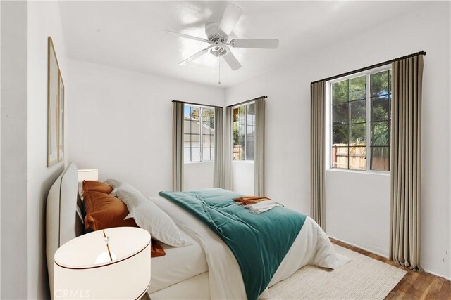 549 E Evans St, San Bernardino, CA 92404 - bedroom with wood finished floors and a ceiling fan