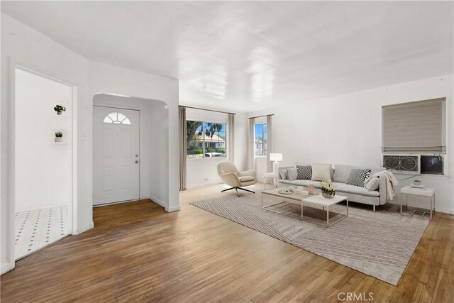 549 E Evans St, San Bernardino, CA 92404 - living area with wood finished floors and arched walkways