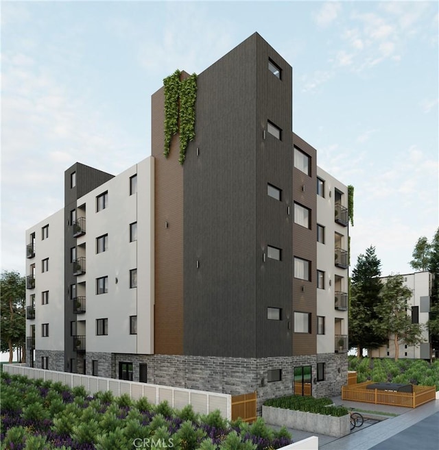 14717 Victory Blvd, Van Nuys, CA 91411 - view of apartment building / complex featuring cooling unit