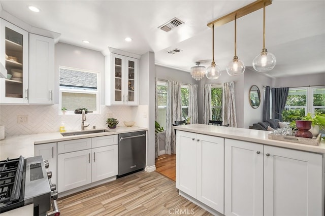 1434 N Rose St, Burbank, CA 91505 - kitchen featuring stainless steel dishwasher, range, light wood finished floors, decorative backsplash, and recessed lighting